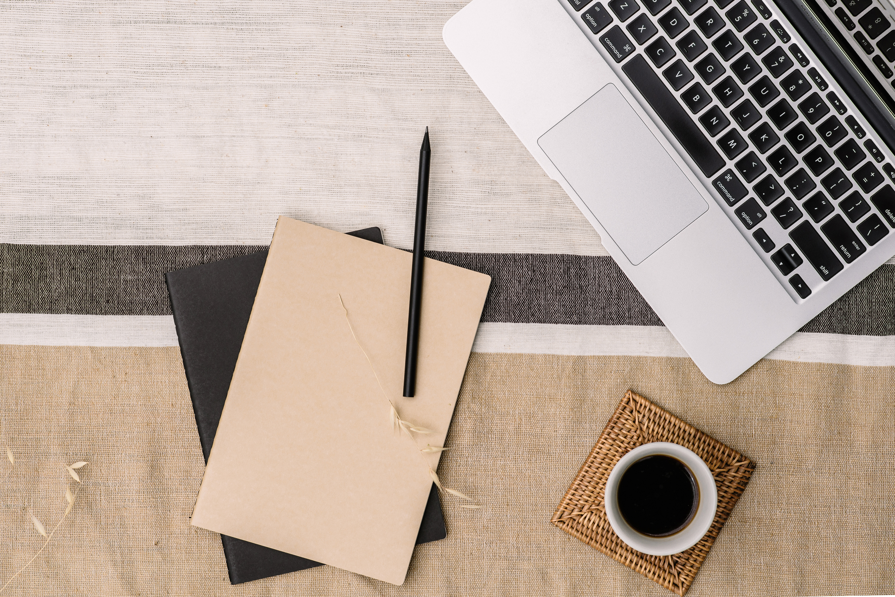Desk scene with coffee and laptop Desk